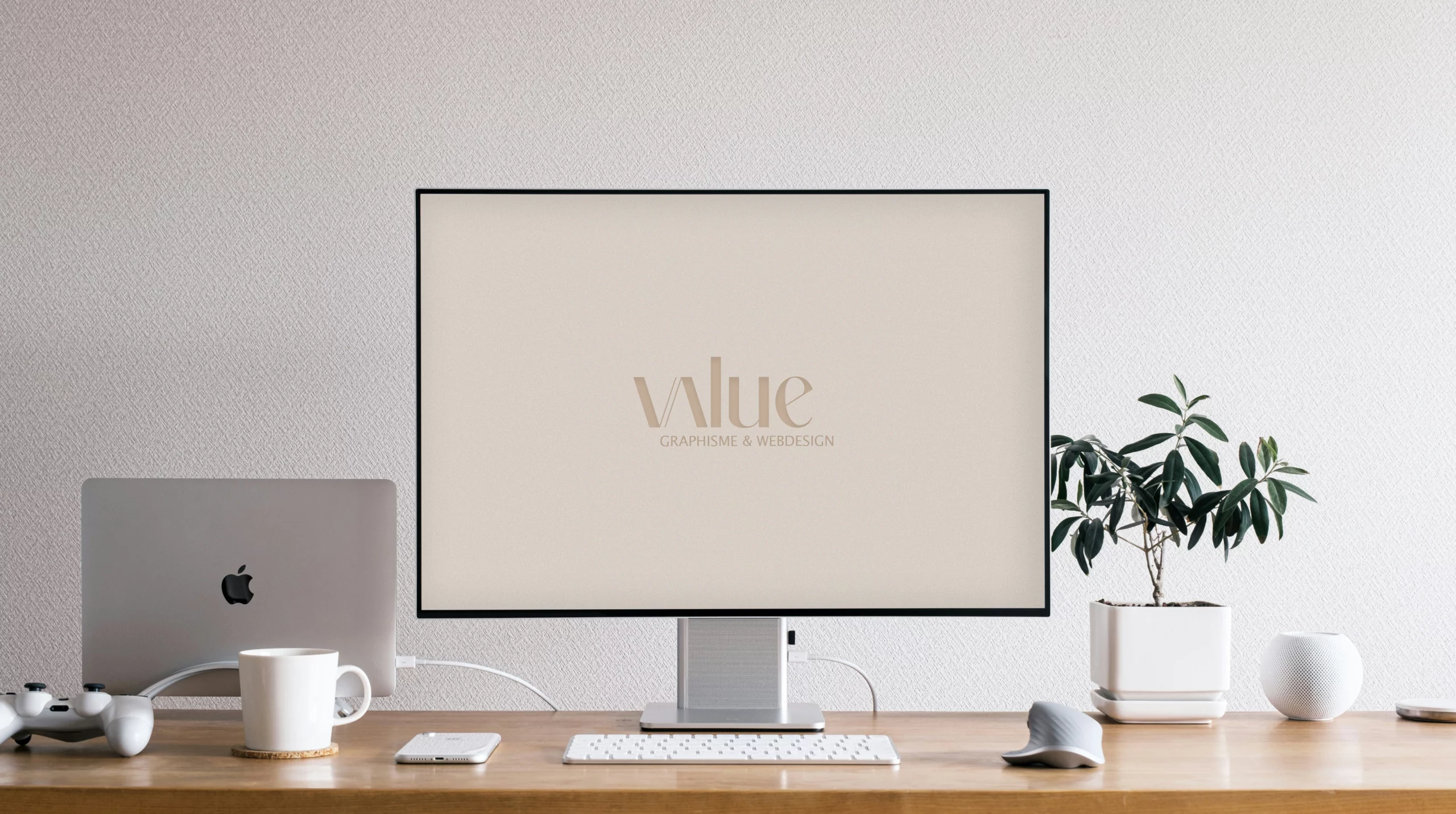 Écran d’ordinateur affichant le logo de Value, agence spécialisée en graphisme et webdesign